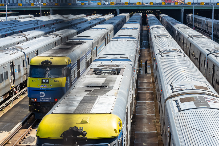 Quirk-Creative-Photo-Long Island NY Rail Road Trains Lines of railroad train cars at a transit station in Long Island, NY
