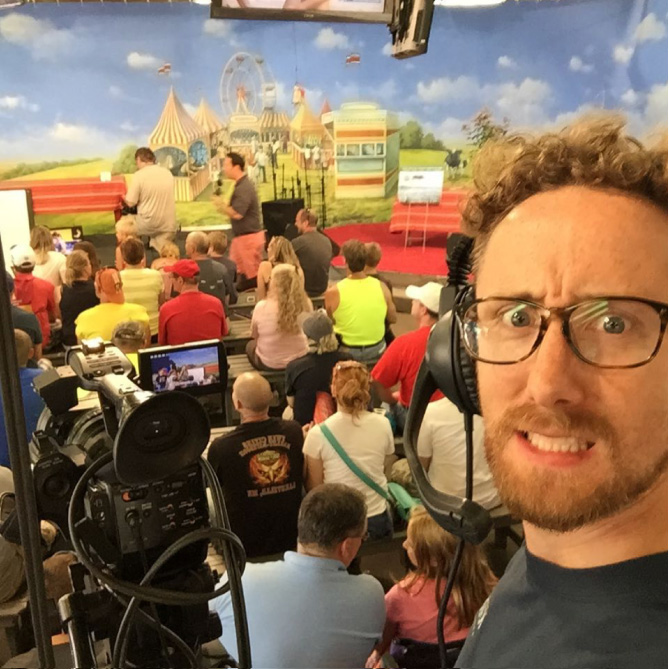 Dan Schuchman filming a segment at a theater production in Minneapolis, MN