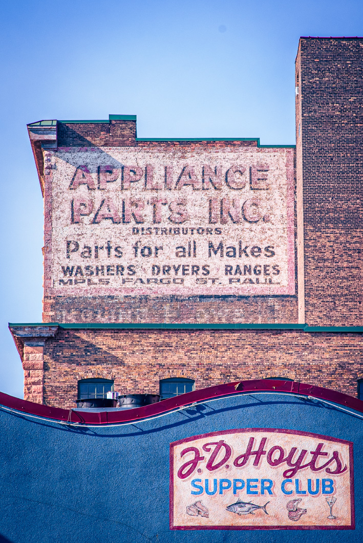 Quirk-Creative-Video-Production-Minneapolis-Downtown Old painted signage on buildings in downtown Minneapolis, MN